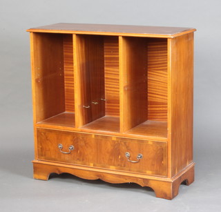 A Georgian style crossbanded yew cabinet fitted shelves and a drawer to the base 92cm h x 91cm w x 36cm d 