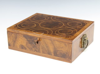 A 19th Century rectangular oyster veneered trinket box with quarter and oyster veneered top and hinged lid and gilt metal drop handles 10cm h x 31cm  w x 25cm d 