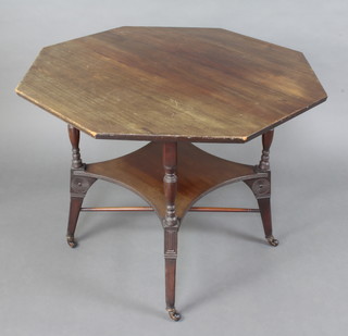 An Edwardian Arts and Crafts octagonal tea table with undertier and X framed stretcher, raised on turned supports 69cm x 89cm x 88cm 