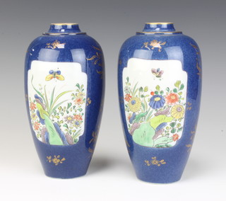 A pair of late 19th Century Chinese blue ground oviform vases decorated with panels of insects and flowers on a blue ground with gilt floral decoration 21cm 