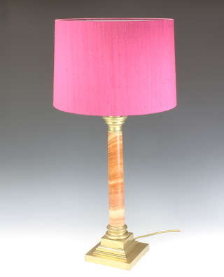 A pink veined marble effect and gilt metal table lamp, raised on a square stepped base 45cm h x 15cm w x 15cm d 