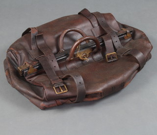 A large leather Gladstone bag complete with key 27cm h x 63cm w x 37cm d 