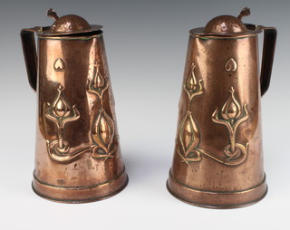 Joseph Sankey and Sons, a pair of hammered copper and willow pattern jugs 24cm h x 15cm diam. the base with Neptune mark and RC09942  