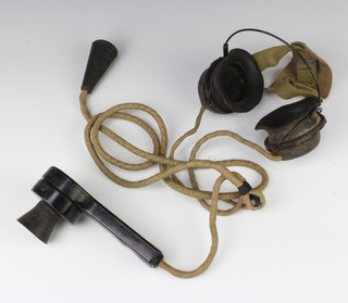 A WWII military microphone "Hand no.2" together with a pair of headphones 