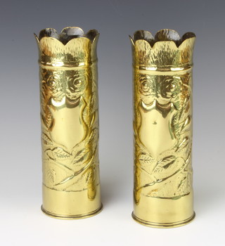 A pair of Continental WWI embossed trench art vases formed from shell cases, the base marked 75DEC BBC74L15C and 1623 16 D 24cm h x 8cm diam. 