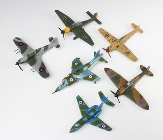 A Dinky Meccano no.719 Spitfire Mk.2, ditto no.721 Junkers JU87B, Dinky Hawker Hurricane Mk.2c propellor, ditto Messerschmitt BF 109E, a Dinky Hawker Siddeley 125 723 (undercarriage missing) and ditto Harrier GR Mk.1 