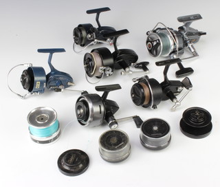 A Mitchell 306 fishing reel with spare spool, a Mitchell 440A fishing reel, ditto 208S reel, ditto 410 with 2 spare spools and an Abu 407 Daiwa A-400RL reel with spare spool 
