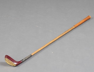A Glenfiddich hickory shafted putter, some contact marks to the head 