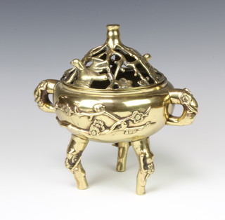 A Japanese polished gilt metal twin handled censer with seal mark to the base 26cm h x 25cm diam. 