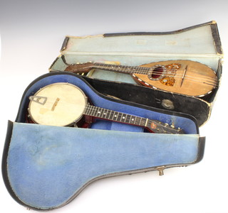 Francesco Solomone, a mandolin labelled Napoli, complete with carrying case (some damage to the back of the mandolin) together with a 6 stringed banjo, cased