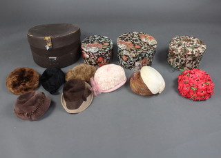 Four hat boxes containing a collection of 9 ladies vintage hats 