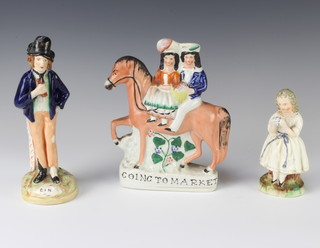 A Staffordshire figure group of a couple seated on a horse going to market 20cm, a ditto Gin and Water 21cm and a figure of a girl 14cm 