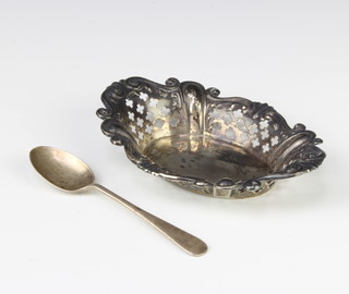 An oval repousse and pierced silver bon bon dish Sheffield 1919 and a silver coffee spoon 36 grams