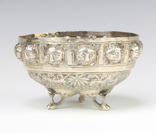 An Indian repousse silver bowl with mask decoration 108 grams 10cm 