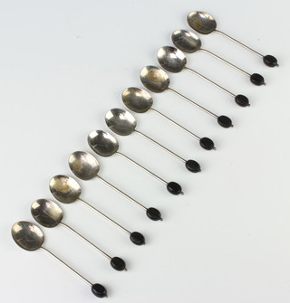 Eleven silver bean end coffee spoons, 71 grams gross, Birmingham 1940