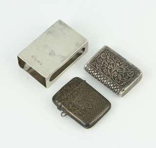 An Edwardian silver vesta Birmingham 1903, 1 other and a silver match sleeve, 97 grams