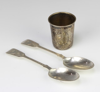 A Continental chased silver cup and 2 spoons, 128 grams 