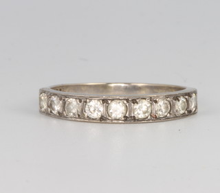 An 18ct white gold 9 stone diamond ring approx. 0.45ct, size R 