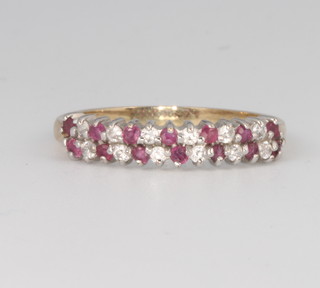 A 9ct yellow gold ruby and diamond ring size O 