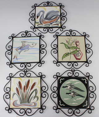 Five mid Century polychrome Carter tiles decorated with birds and animals etc, contained in wrought iron frames 23cm 
