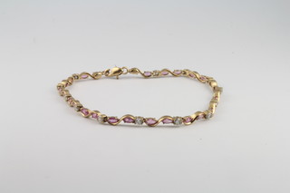 A 9ct yellow gold gem set bracelet, 5.3 grams 