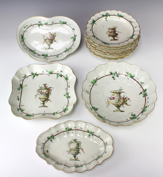 A creamware dessert service decorated with classical urns of flowers enclosed in floral borders comprising a circular bowl, square serving dish, 2 shaped dishes and 10 shallow dishes 