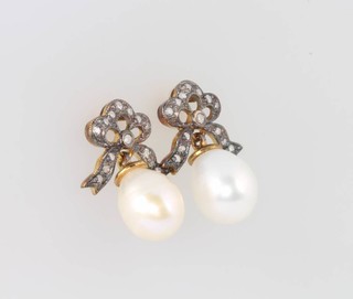 A pair of silver gilt Edwardian style cultured pearl and diamond drop earrings with tied bow tops 20cm 