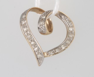 A 9ct yellow gold diamond set heart shaped pendant 1.3 grams, 11mm 