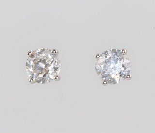 A pair of 18ct white gold brilliant cut diamond ear studs approx. 1.42ct 