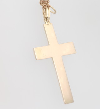 A 9ct yellow gold cross and chain 3.9 grams 