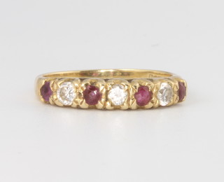 An 18ct yellow gold ruby and diamond ring size L 2.4 grams 