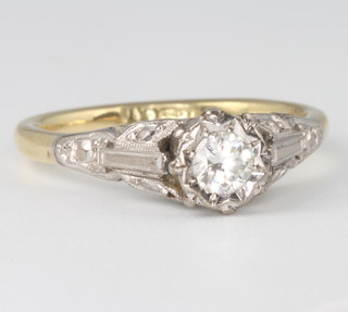 An 18ct yellow gold diamond ring approx. 0.2ct, 2.6 grams, size L 