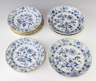 A small service of early 20th Century Meissen onion pattern tableware comprising 7 plates and 3 dishes 