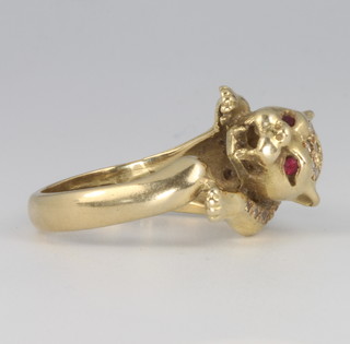 An 18ct yellow gold diamond and ruby set leopard ring, size N, 7.3 grams 