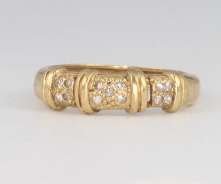 An 18ct yellow gold diamond set dress ring size M, 2.5 grams