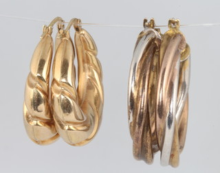 Two pairs of 9ct yellow gold hoop earrings 7.5 grams 