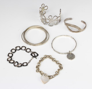 Six silver bracelets and bangles 168 grams