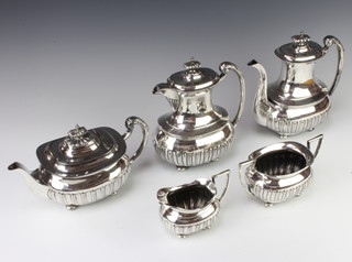 A silver plated Walker and Hall 5 piece demi-fluted tea and coffee set 