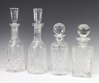 A pair of tapered decanters and stoppers 33cm, 2 others 