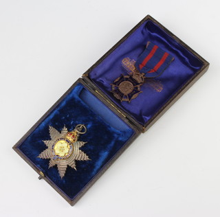 A Primrose League Dress badge and a sports medallion 
