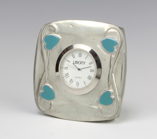 A contemporary Liberty pewter timepiece with a quartz movement and enamelled decoration 8cm 