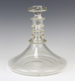 A clear glass ships decanter and stopper with 4 ring neck, 23cm 