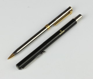A Tiffany & Co steel cased and gilt metal mounted propelling pencil and a Parker ballpoint pen, case marked Rolex 
