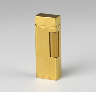 A gentleman's gold plated engine turned Dunhill cigarette lighter 