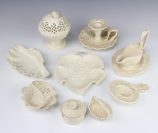 A collection of Leedsware classical creamware and Royal creamware, comprising a pair of chamber sticks, bowls, dishes, sauce boat etc  