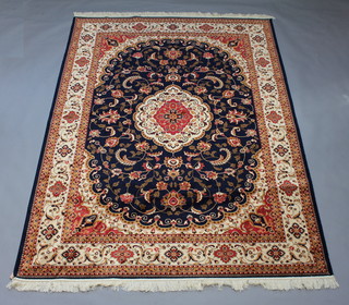 A blue and gold ground Belgian cotton Kashan style carpet with central medallion 280cm x 200cm 