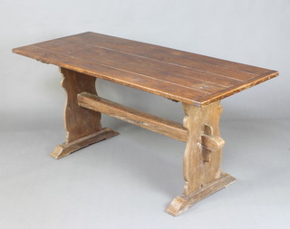 An 18th/19th Century elm refectory dining table, the top formed of 5 planks, raised on standard end supports with H framed stretcher  66cm h x 168cm l x 69cm w  
