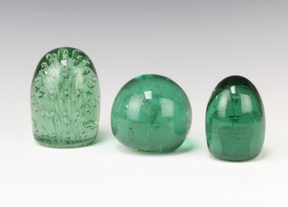 A Victorian green glass dump decorated a flower 10cm, a ditto 10cm and another 6cm 