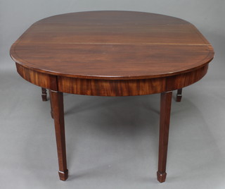 A Georgian mahogany D end dining table with crossbanded and ebonised top, raised on 8 square tapered supports 73cm h x 137cm w x 133cm l x 192cm when extended 
