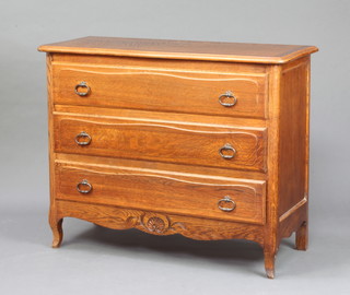 A French light oak chest of 3 drawers with iron ring drop handles, raised on cabriole supports 86cm h x 105cm w x 44cm d 